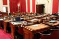 Hand carved, black walnut members' desks in House of Delegates in the West Virginia State Capitol. Charleston, WV.