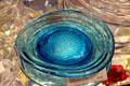 Sea shell bowls in copper blue at Fostoria Glass Museum. Moundsville, WV.