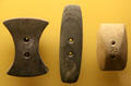 Adena culture gorget ornaments always two holes at Grave Creek Mound Museum. Moundsville, WV.