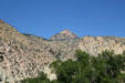 Pyramid shaped formation in Big Horn mountains landscape along US 14. WY.