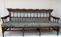 Settee by George Jack for Morris & Co with Peacock & Dragon fabric by William Morris at Walker Art Gallery. Liverpool, England