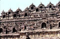 Carvings on Borobudur are earthly below & heavenly at higher levels. Indonesia.