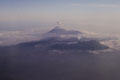 Volcano on Java gives off plume of smoke. Indonesia.