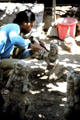 Balinese carver working on sculpture. Bali, Indonesia.