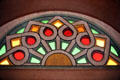 Colored glass fan light in haveli. Mandawa, India.