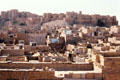 The fort rises above Jaiselmer. India.