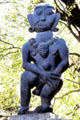 Stone sculpture sits on a boulder in Sculpture Garden, Harare, a country known for carving. Zimbabwe.